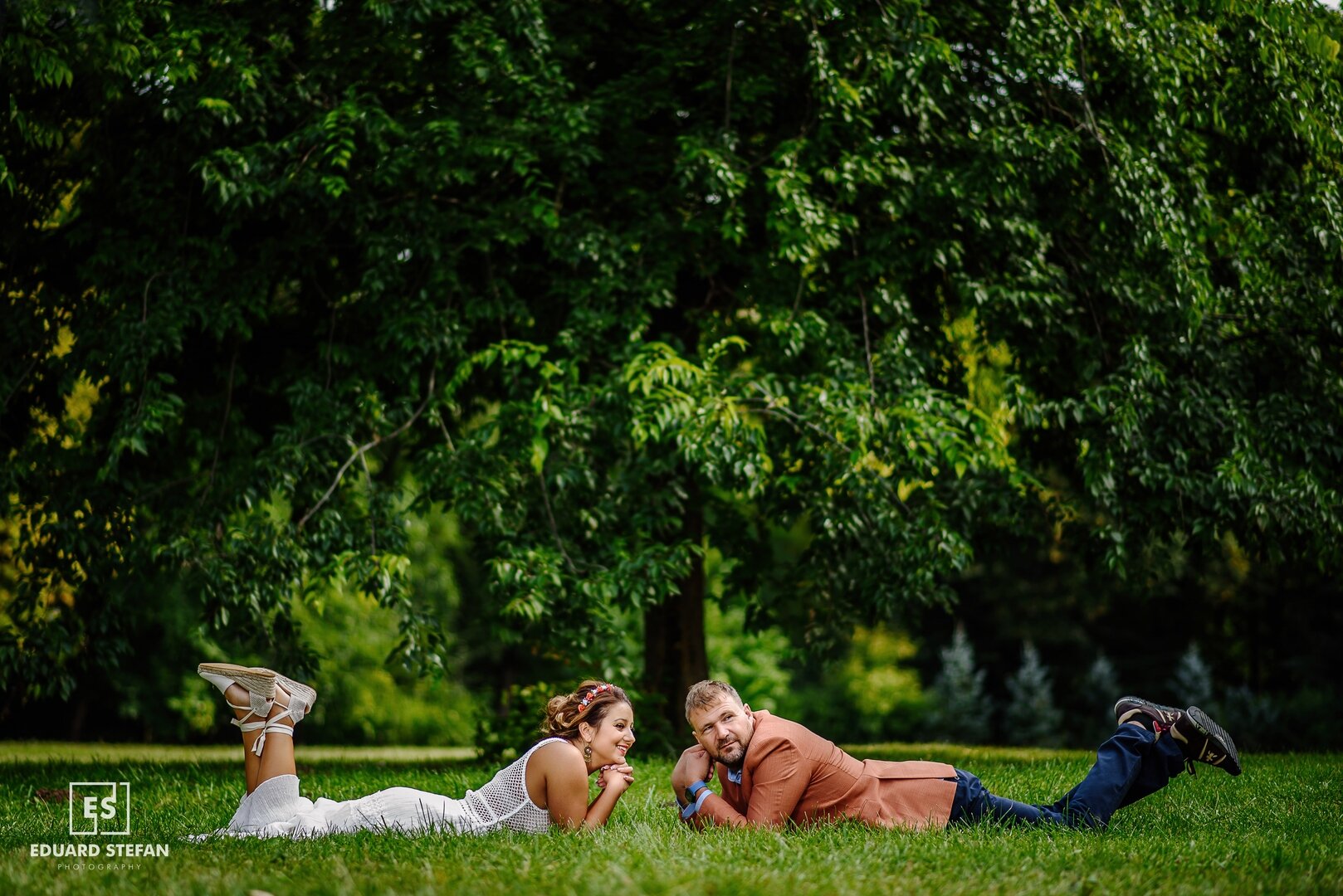 Couple Laying in the Grass